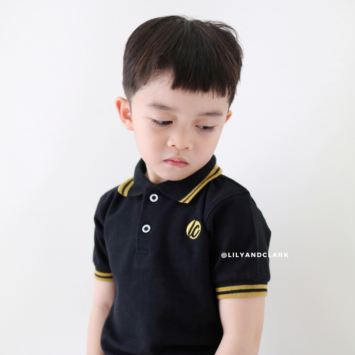 Lily And Clark Kaos Polo Anak Laki-Laki Warna Hitam KK10